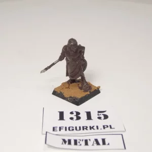Zdradliwa i ponętna kobieta z włócznią i gołą łydką. Metal 1315